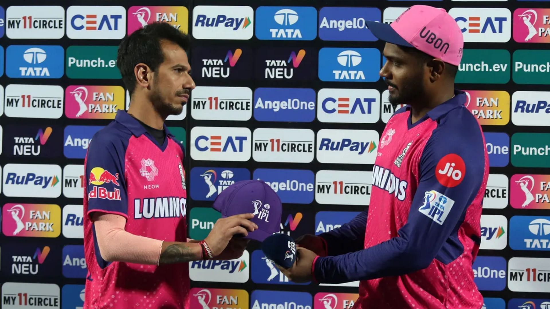 Sanju Samson hands the Purple cap to Yuzvendra Chahal