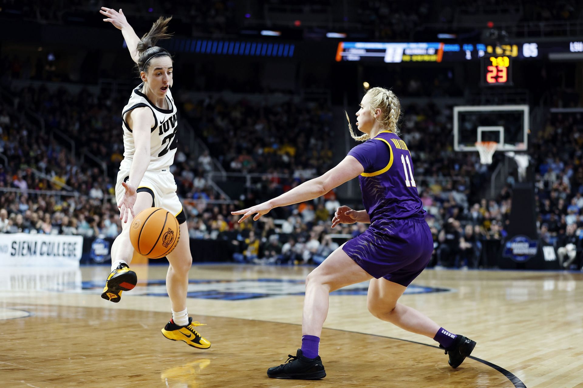 ALBANY, NEW YORK, APRIL 01: Hailey Van Lith #11 of the LSU Tigers looks to pass in front of Caitlin Clark #22 of the Iowa Hawkeyes during the second half in the Elite 8 round of the NCAA Women&#039;s Basketball Tournament at MVP Arena on April 1, 2024, in Albany, New York. (Photo by Sarah Stier/Getty Images)