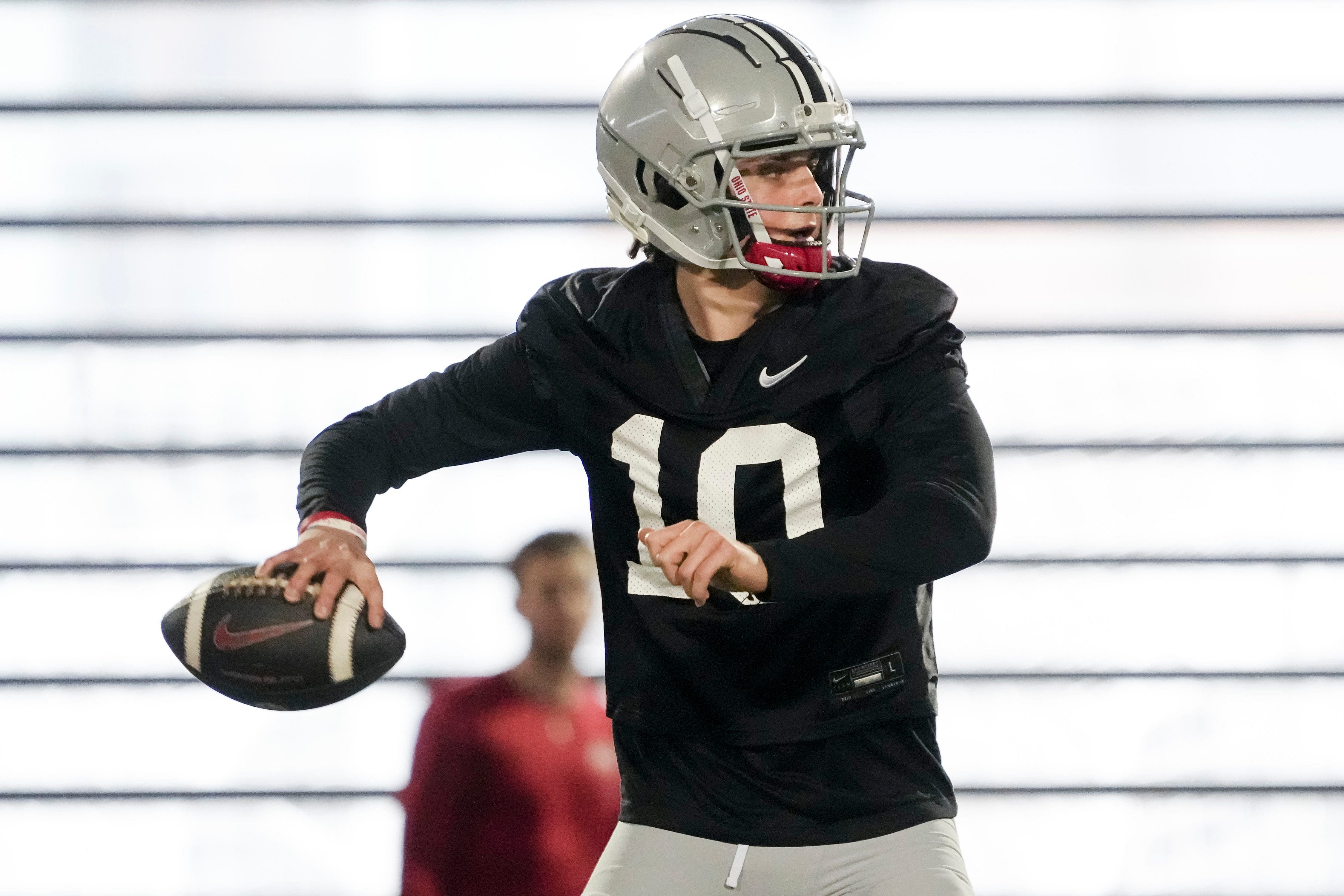 Mar 7, 2024; Columbus, OH, USA; Ohio State Buckeyes quarterback Julian Sayin (10) takes a snap during spring football practice at the Woody Hayes Athletic Center.