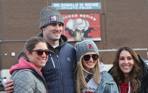 Daniel Jones poses with fans