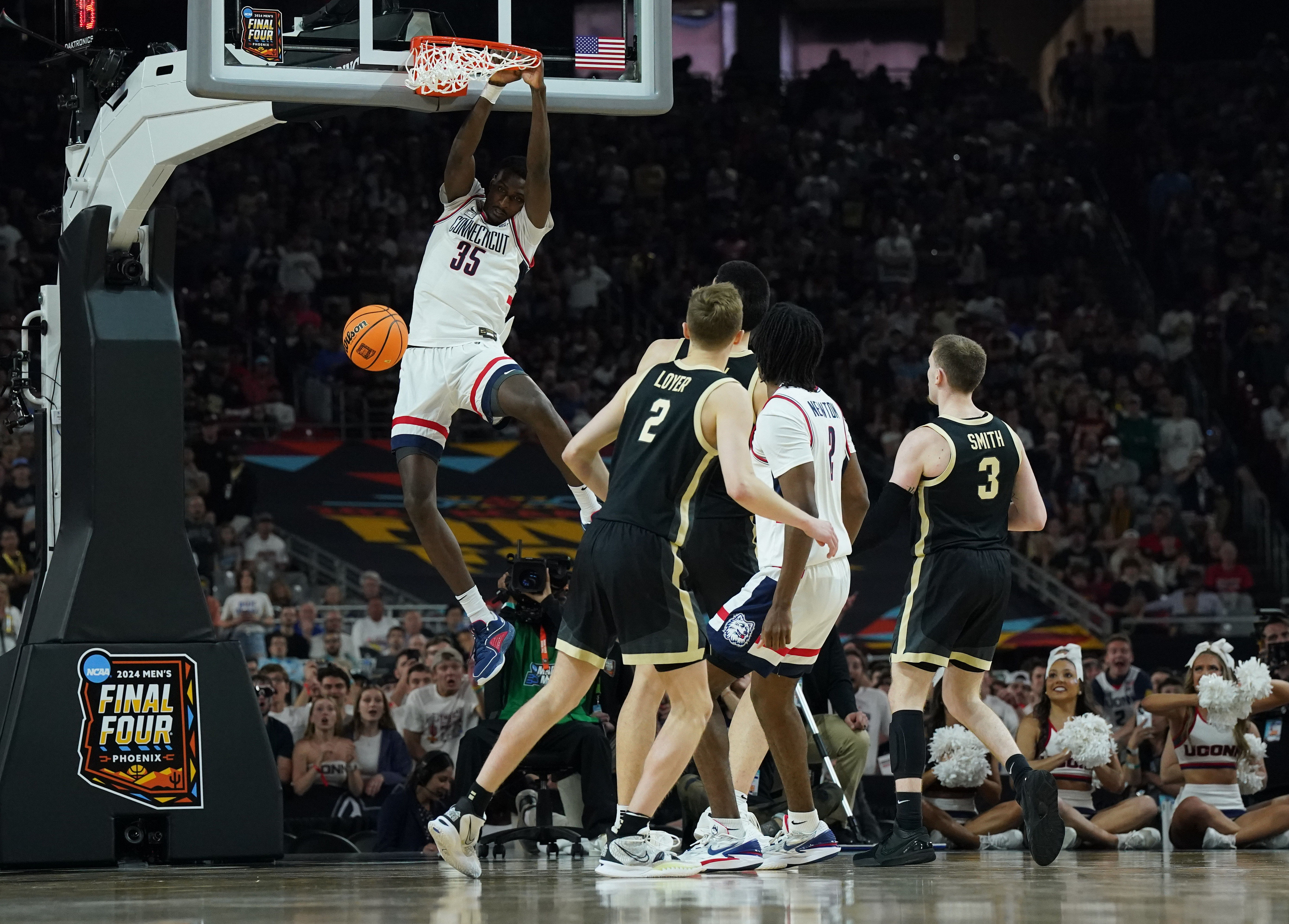UConn forward Samson Johnson throws down a dunk in the national championship game. He&#039;s one of the most significant expected returnees next season for the Huskies.