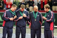 Mike Bryan, Bob Bryan, James Blake, and Andy Roddick (from left to right) after winning the 2007 Davis Cup