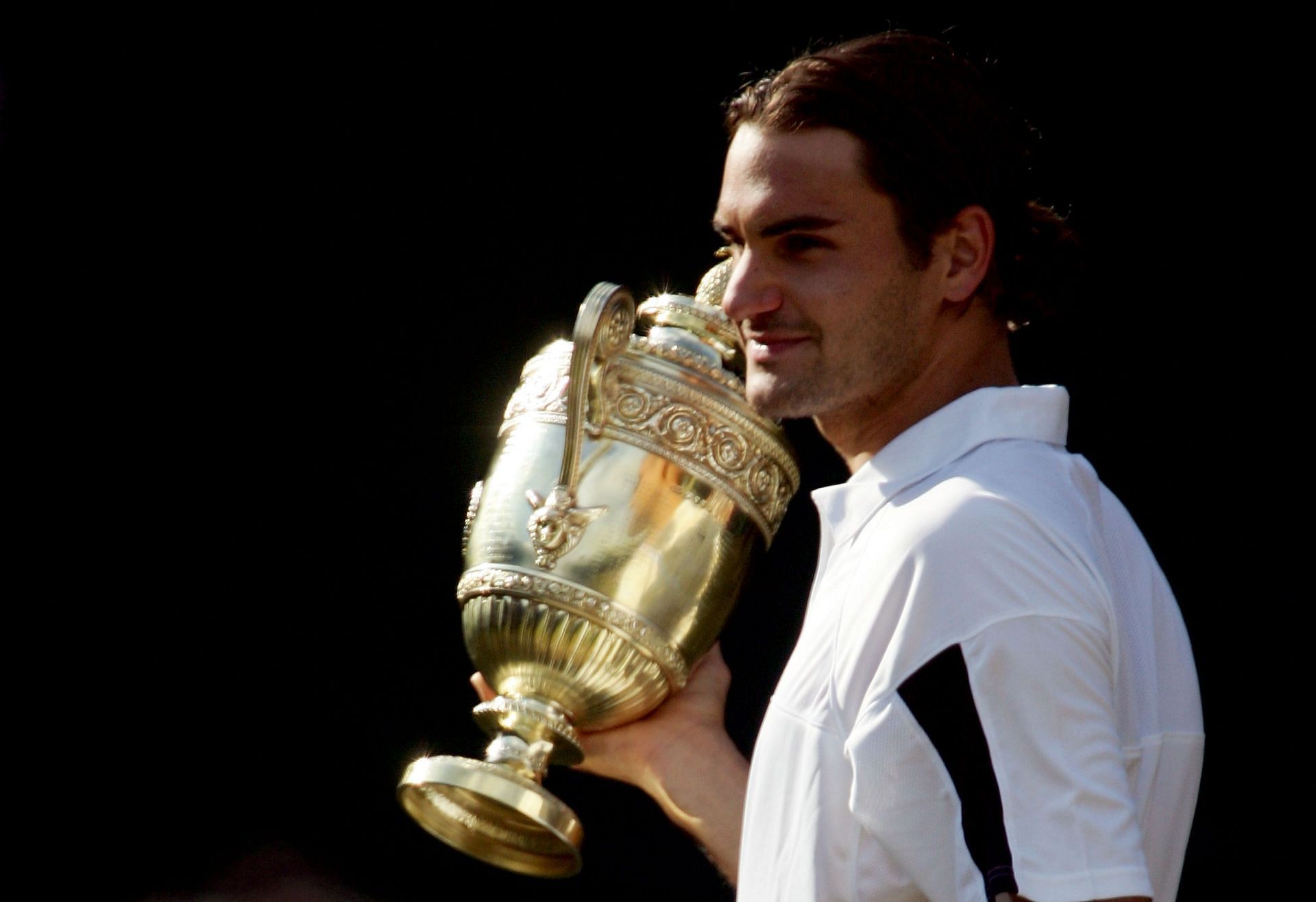 Roger Federer after winning the Wimbledon Championship in 2004