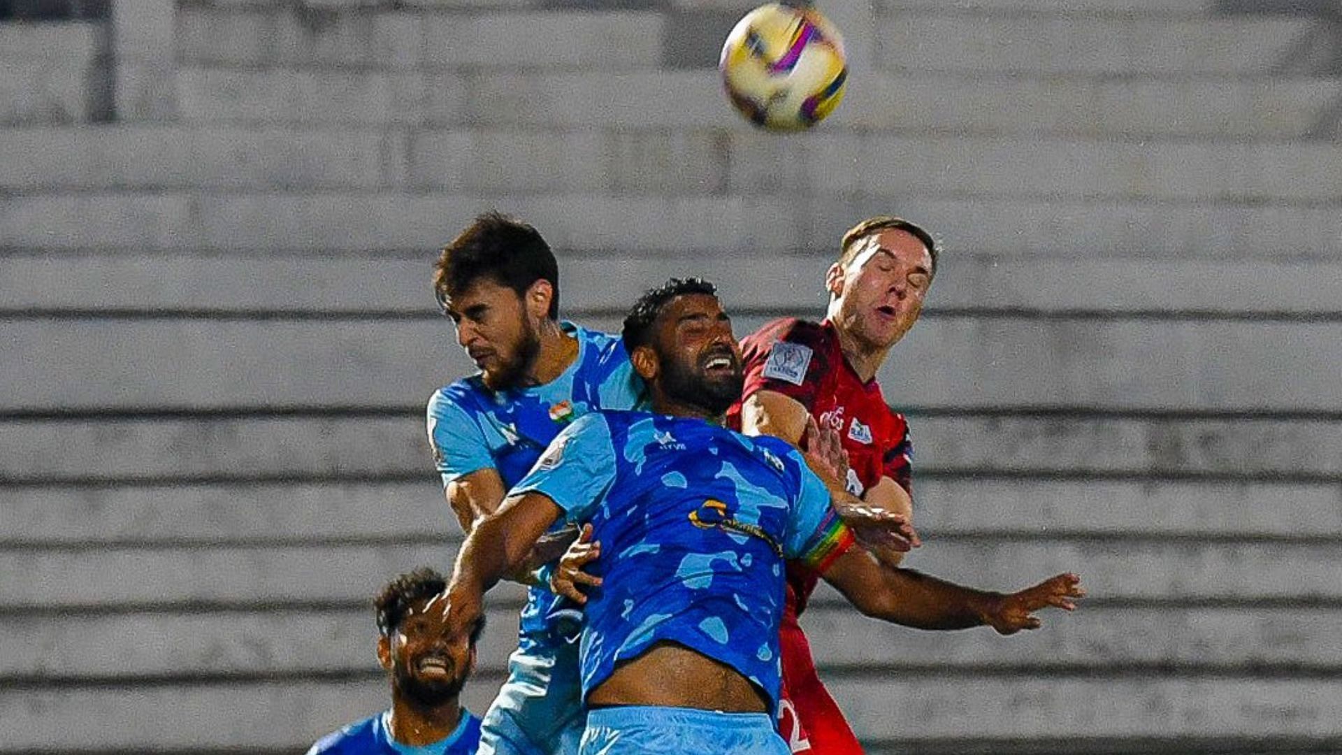 Gokulam Kerala FC player attempting a header during corner kick