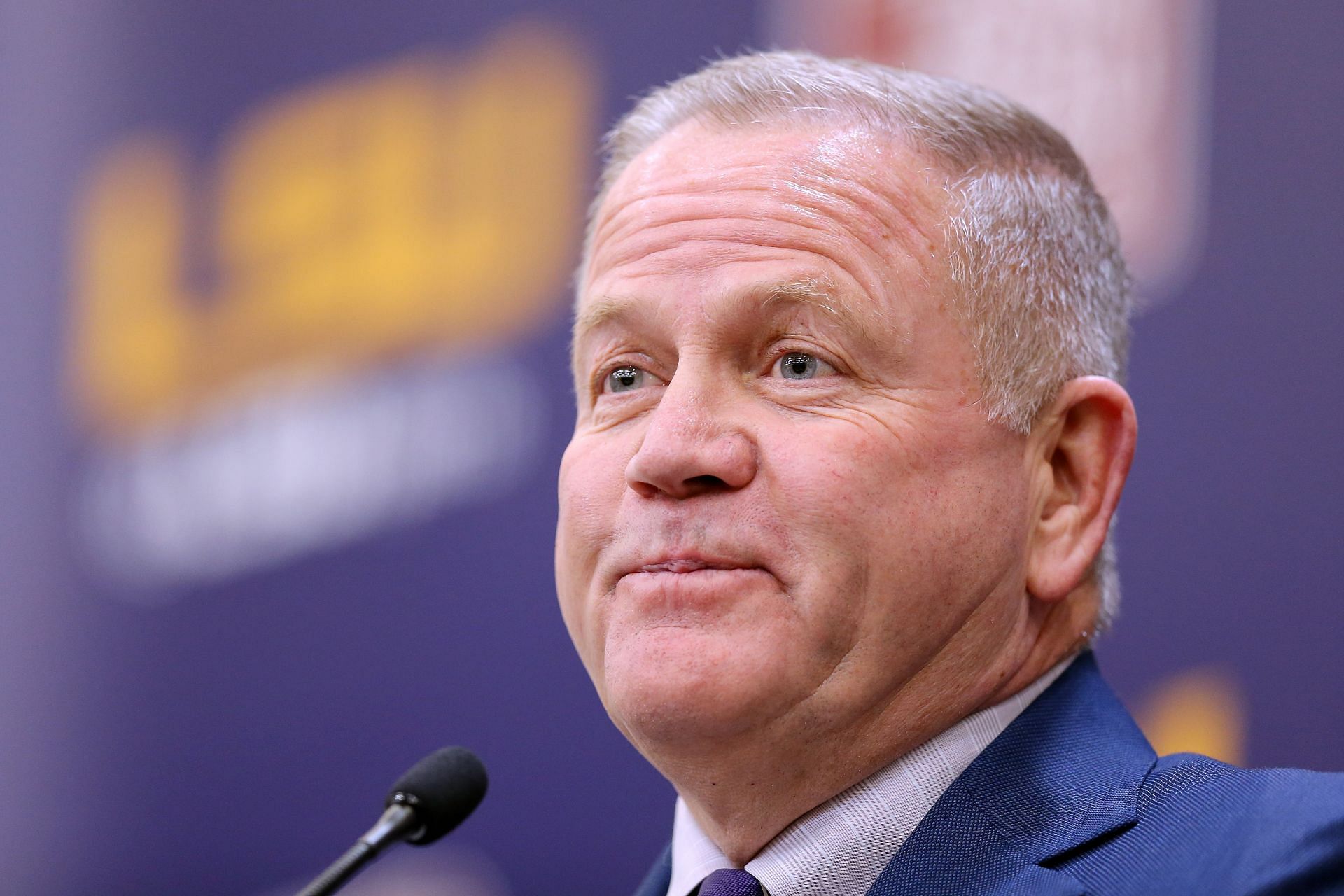 Brian Kelly speaks during a news conference at Tiger Stadium.
