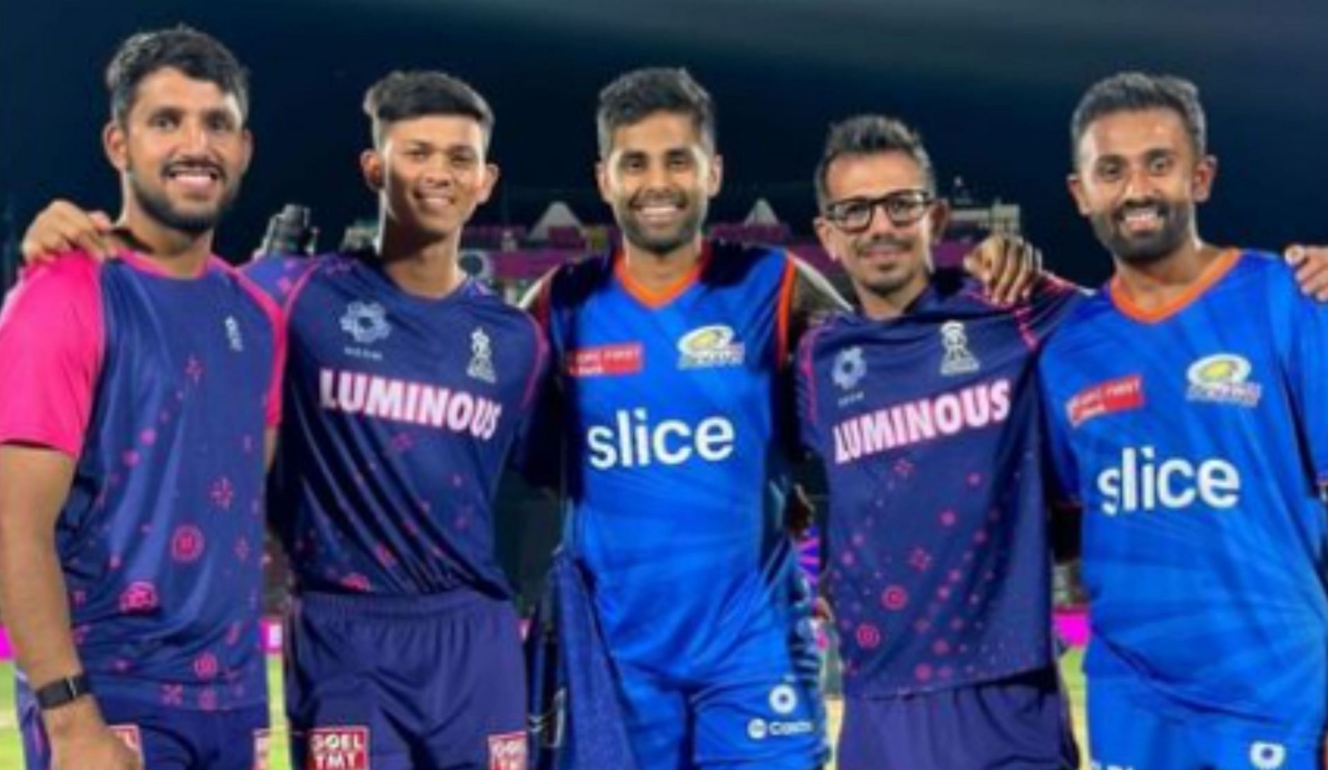 Yashasvi Jaiswal with his RR teammates and a couple of MI players. 