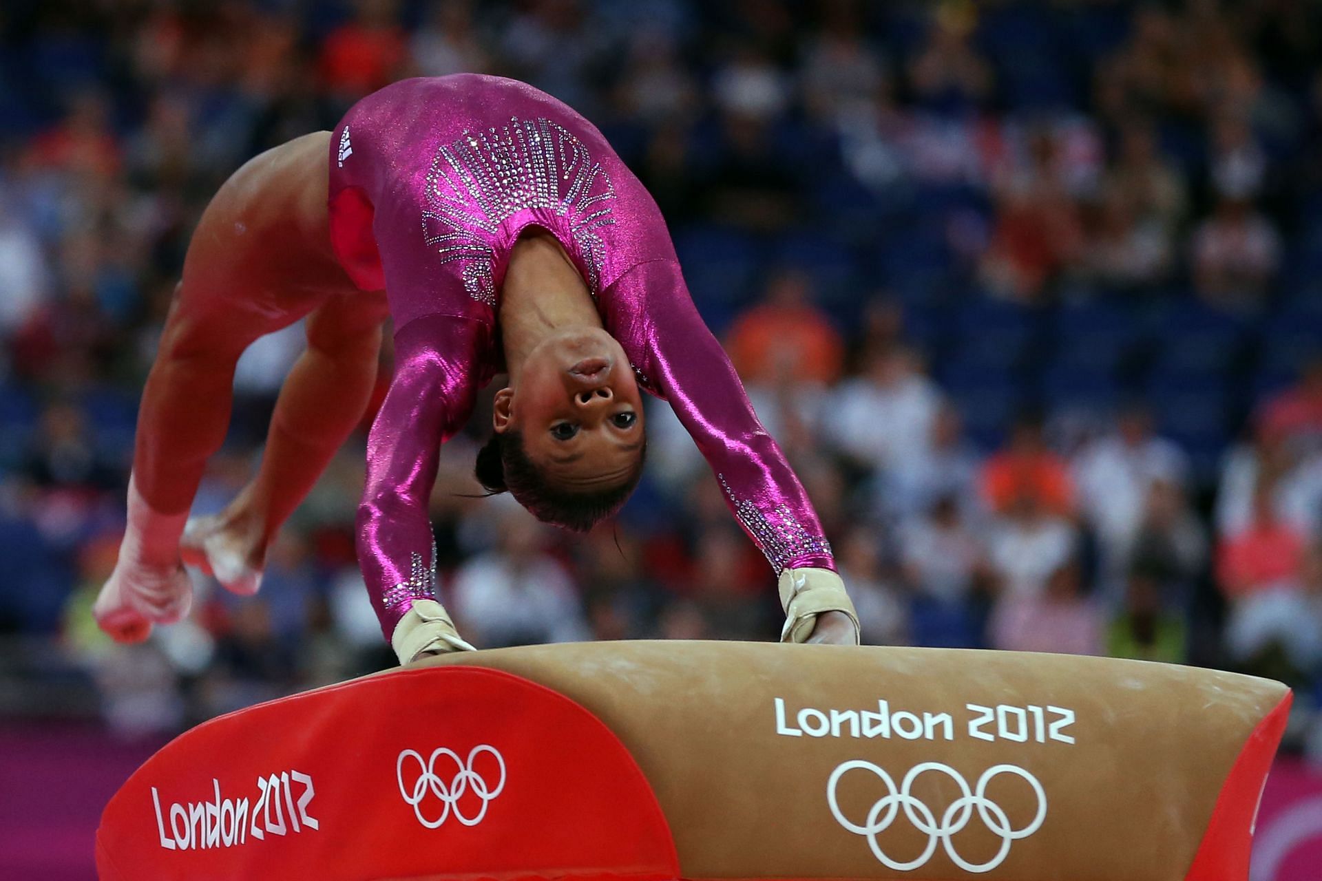 Gabby Douglas competes on the vault in the Artistic Gymnastics Women&#039;s Individual All-Around final at the London 2012 Olympic Games. (Photo by Streeter Lecka/Getty Images)