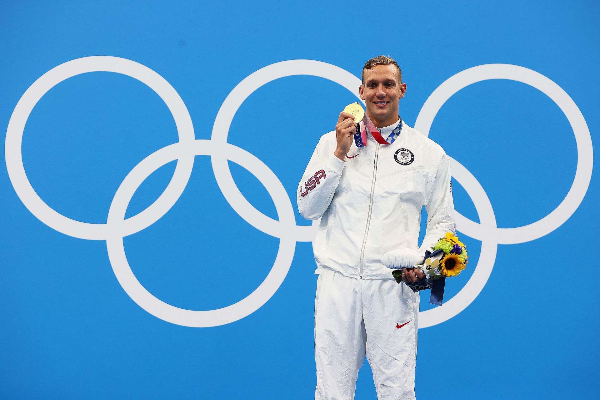 Caeleb Dressel of Team United States poses with the gold medal for the Men&#039;s 100m Freestyle Final on day six of the Tokyo 2020 Olympic Games at Tokyo Aquatics Centre on July 29, 2021 in Tokyo, Japan. (Photo by Tom Pennington/Getty Images)