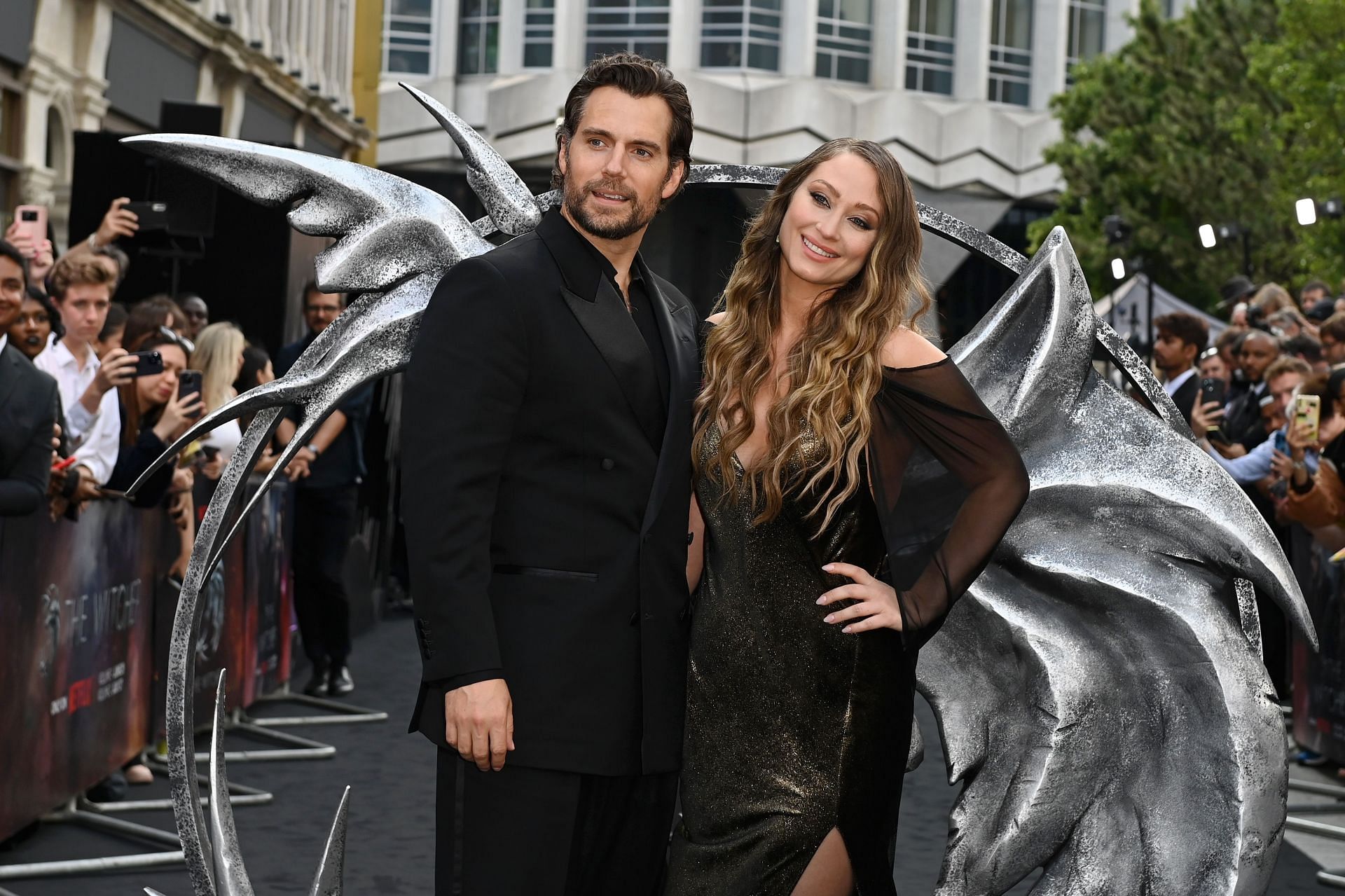 Henry Cavill and Natalie Viscuso at &quot;The Witcher&quot; Season 3 Premiere (via Getty/Kate Green)