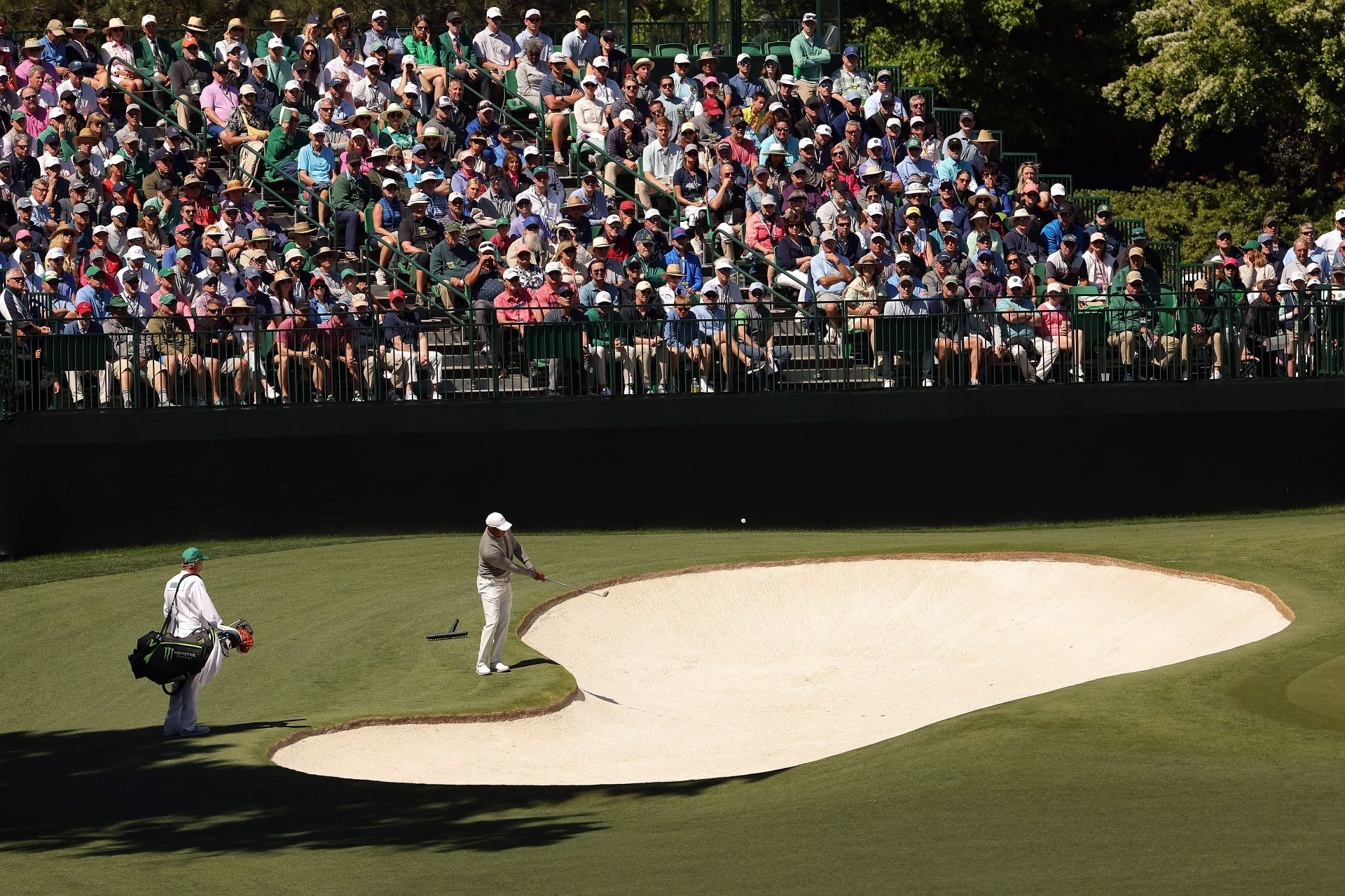 Tiger Woods at the fourth hole&#039;s bunker