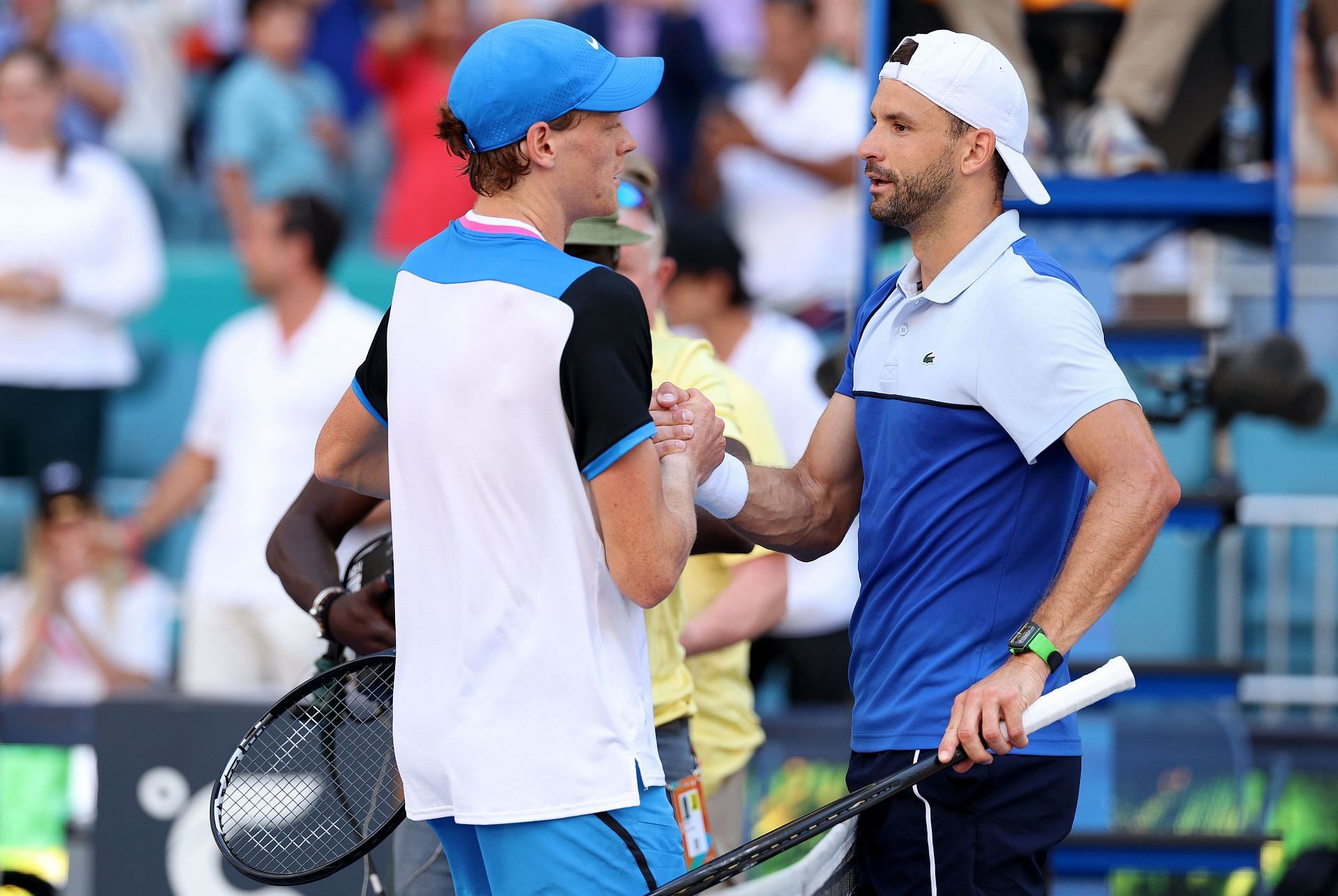 Grigor Dimitrov (R) pictured with Jannik Sinner (L) after the 2024 Miami Open final