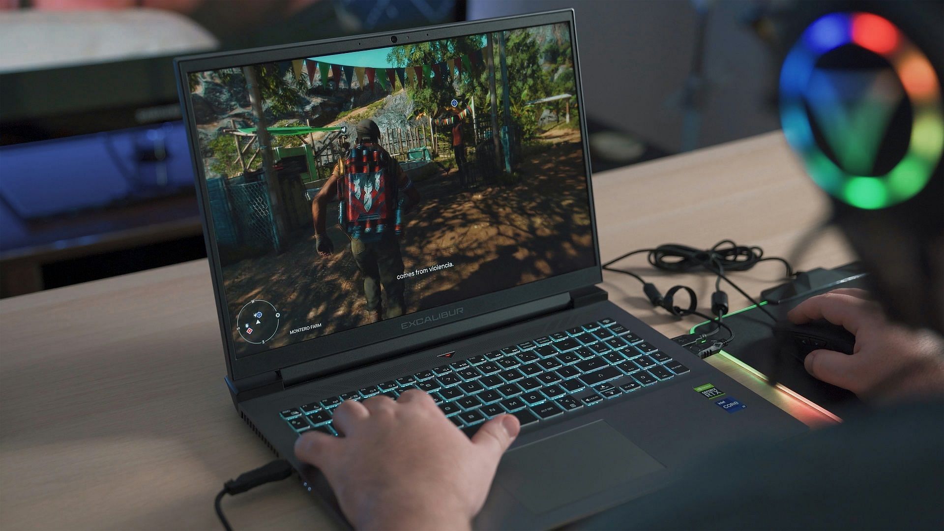 Picture of gaming laptop with gaming RGB headset