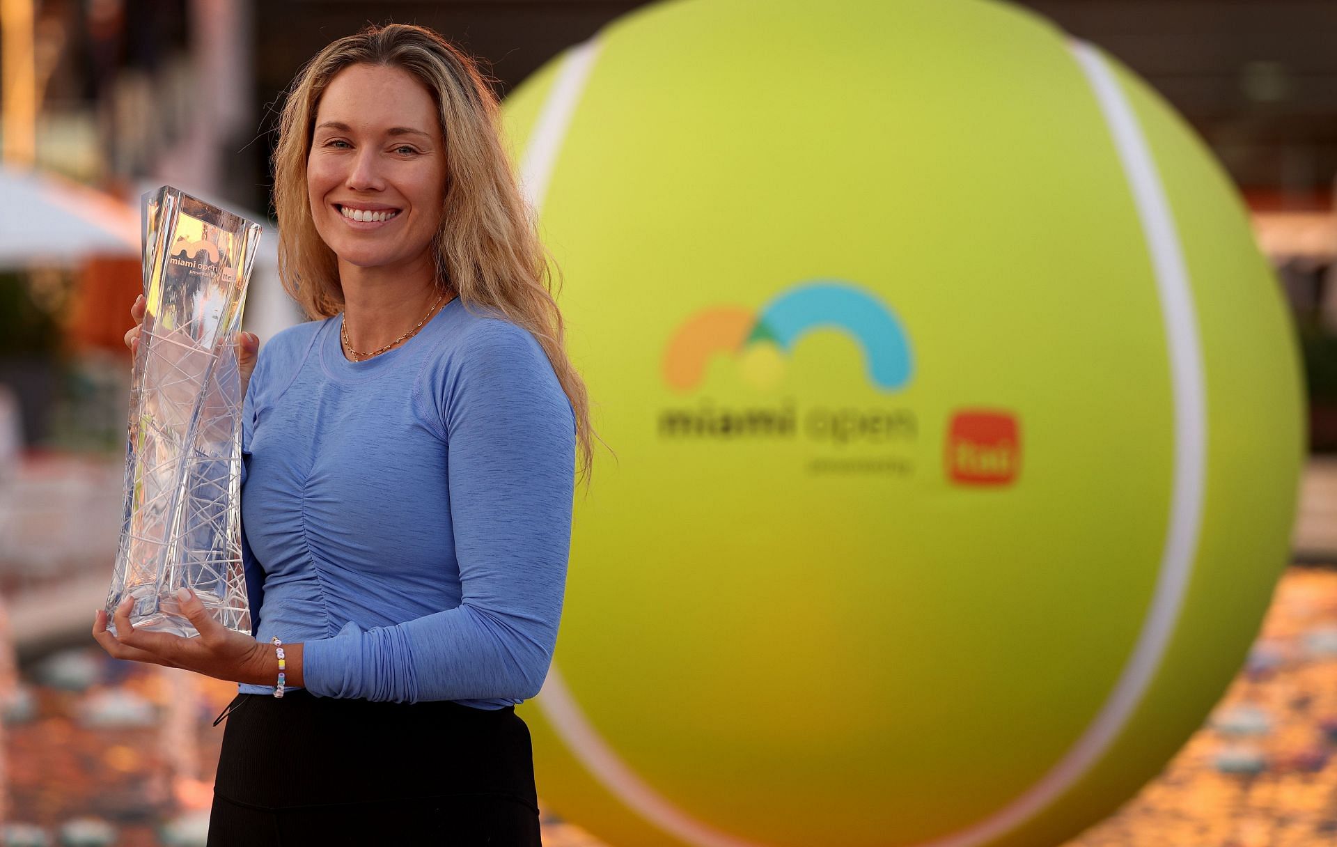 Danielle Collins posing with the 2024 Miami Open trophy