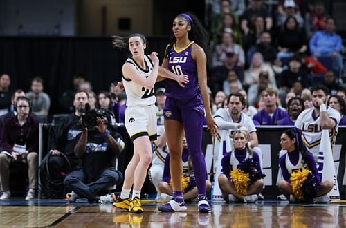 Iowa's Caitlin Clark and LSU's Angel Reese guarding each other.