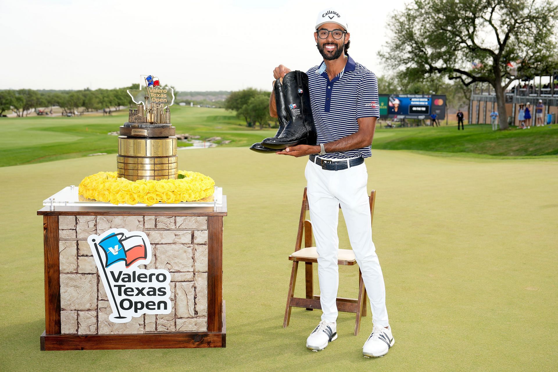 Akshay Bhatia with trophy at Valero Texas Open (Photo by Raj Mehta/Getty Images)