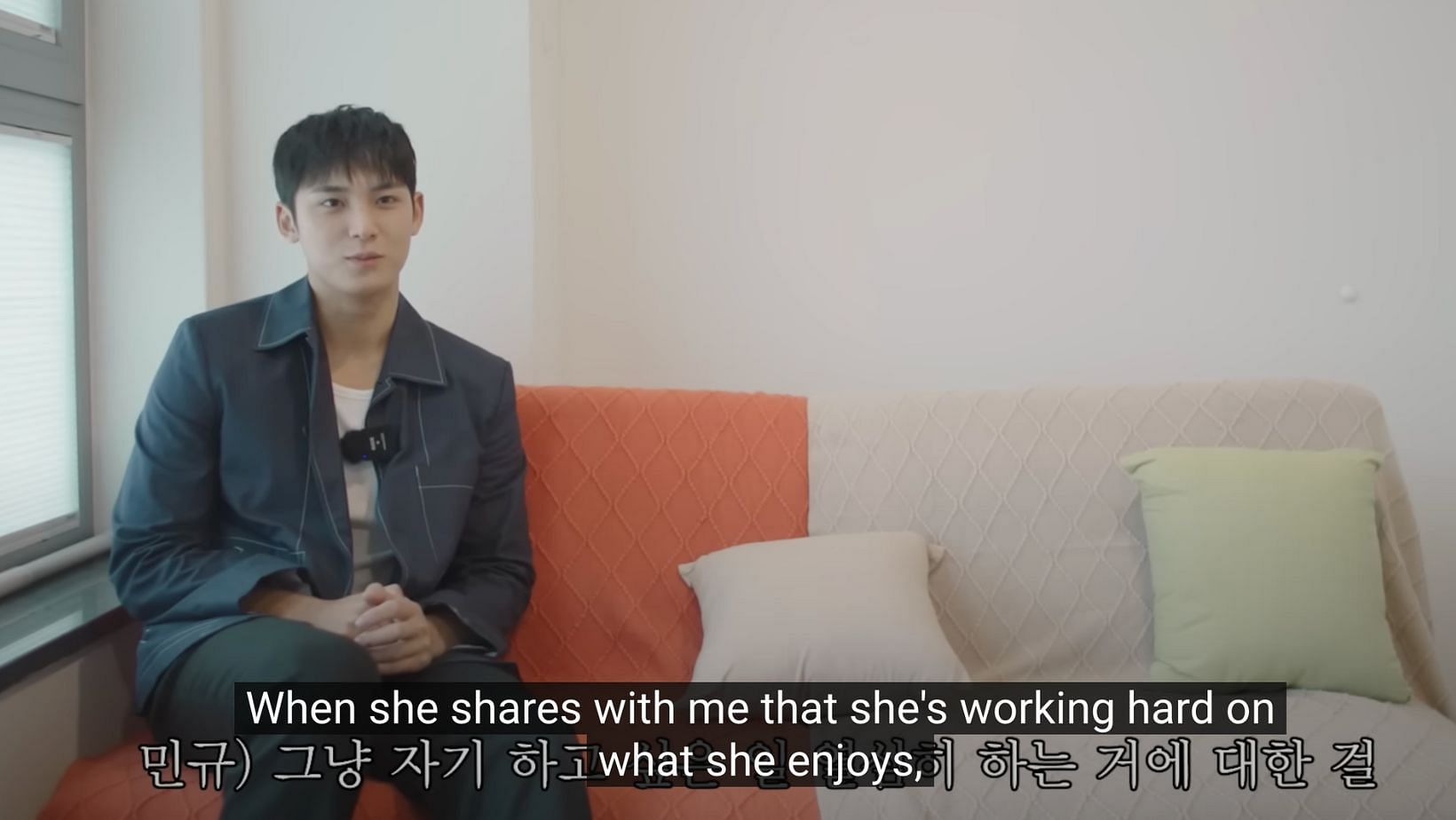 Mingyu shares how he feels happy whenever his sister shares her goals and everyday life with him. (Screenshot via YouTube video/DdeunDdeun)
