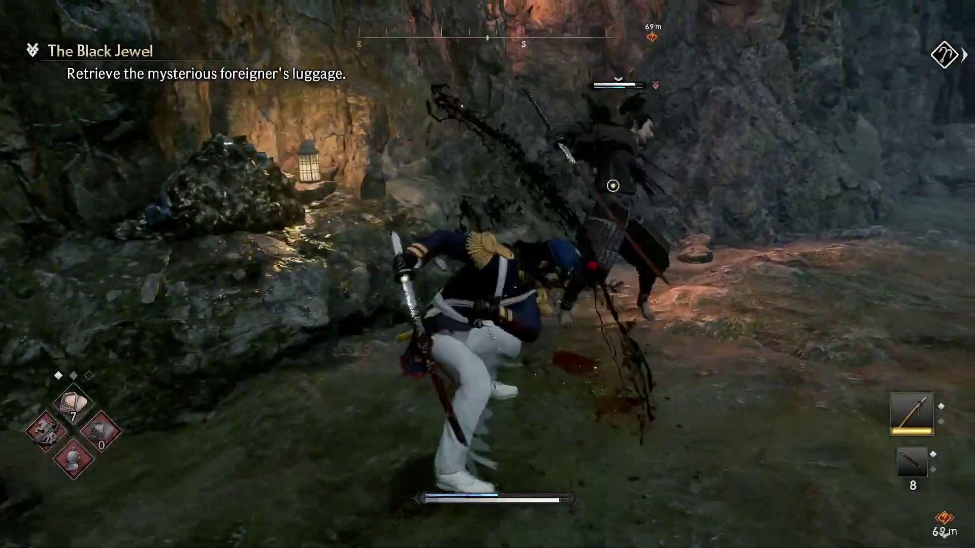 Fighting the bandits in a cave (Image via Sony Interactive Entertainment)