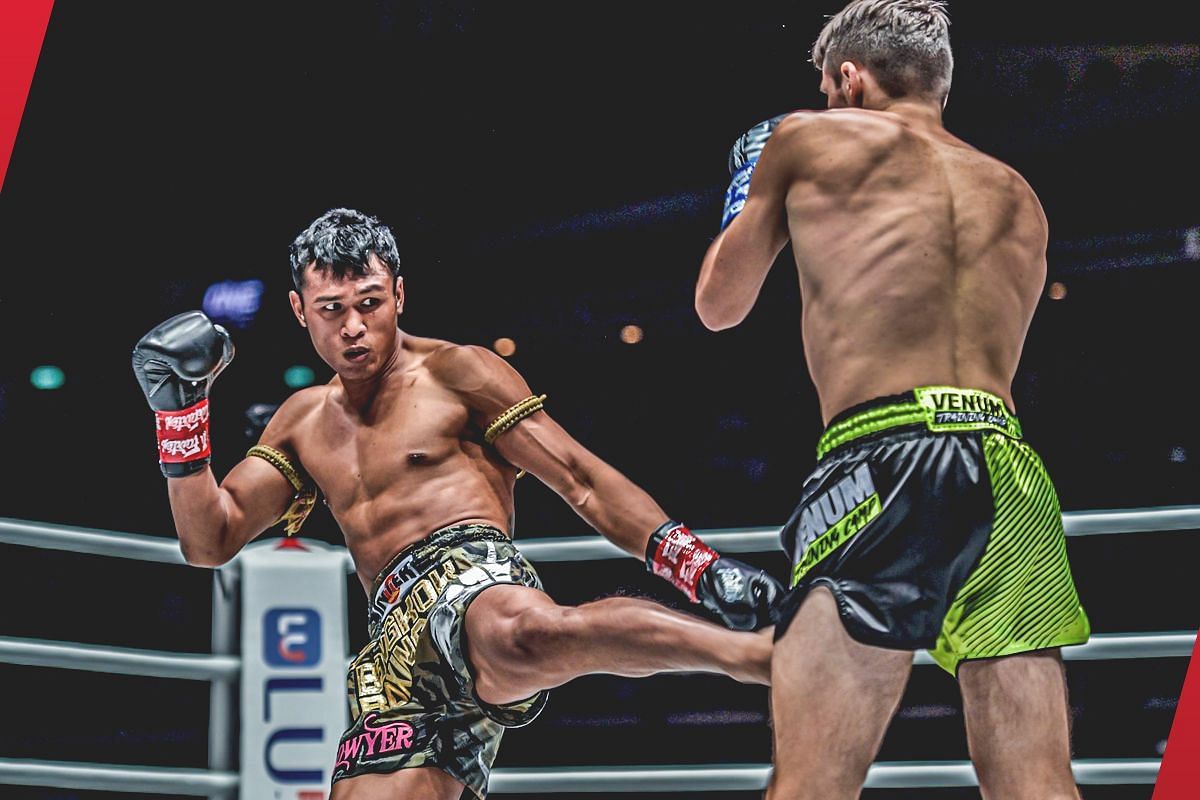 Jo Nattawut throws a leg kick against Sasha Moisa [Photo via: ONE Championship]