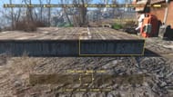 You can set up some solid defenses above on Red Rocket Truck Stop's roof. (Image via Bethesda || YouTube/VinylicPumaGaming)