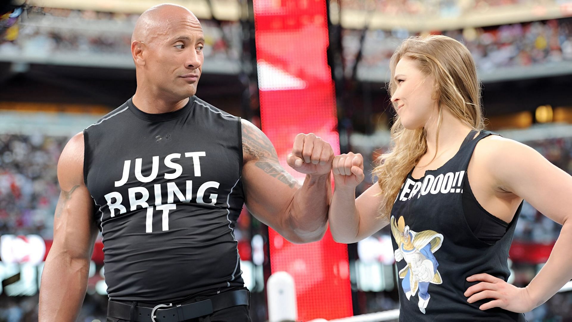 Dwayne Johnson and Ronda Rousey as seen in WrestleMania (Image via WWE)