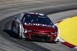 WATCH: Chase Elliott spins Ricky Stenhouse Jr. on pit road at Martinsville, #47 crew narrowly avoids injury