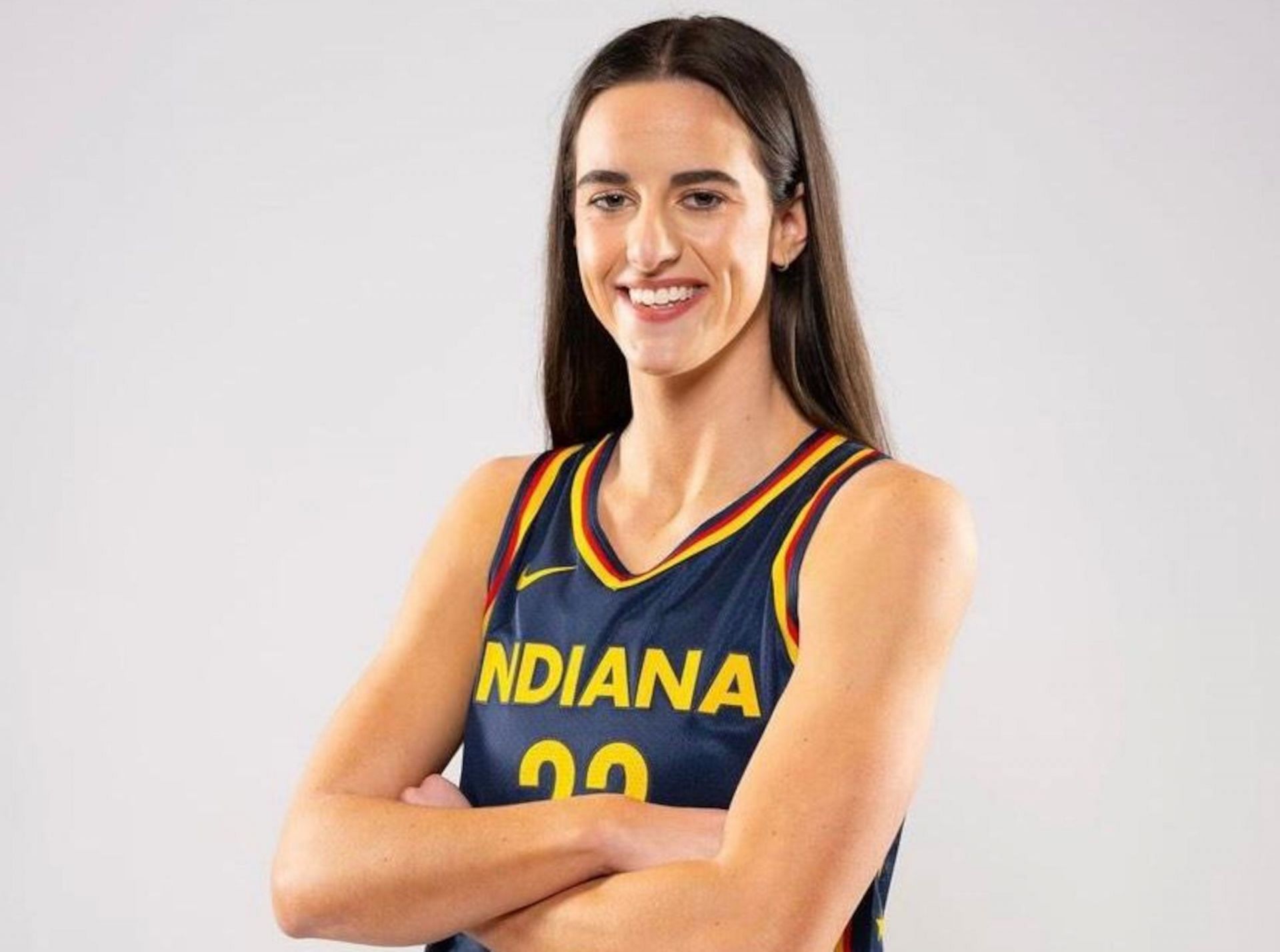 Rookie Caitlin Clark all smiles rocking her Indiana Fever jersey. 