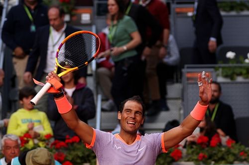 Rafael Nadal soaking in the crowd's applause after his first-round win against Darwin Blanch at the 2024 Mutua Madrid Open