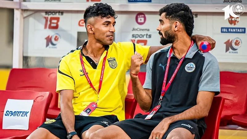 Akash Mishra (right) chatting with former Hyderabad FC teammate Abdul Rabeeh (left) on Wednesday. [ISL]