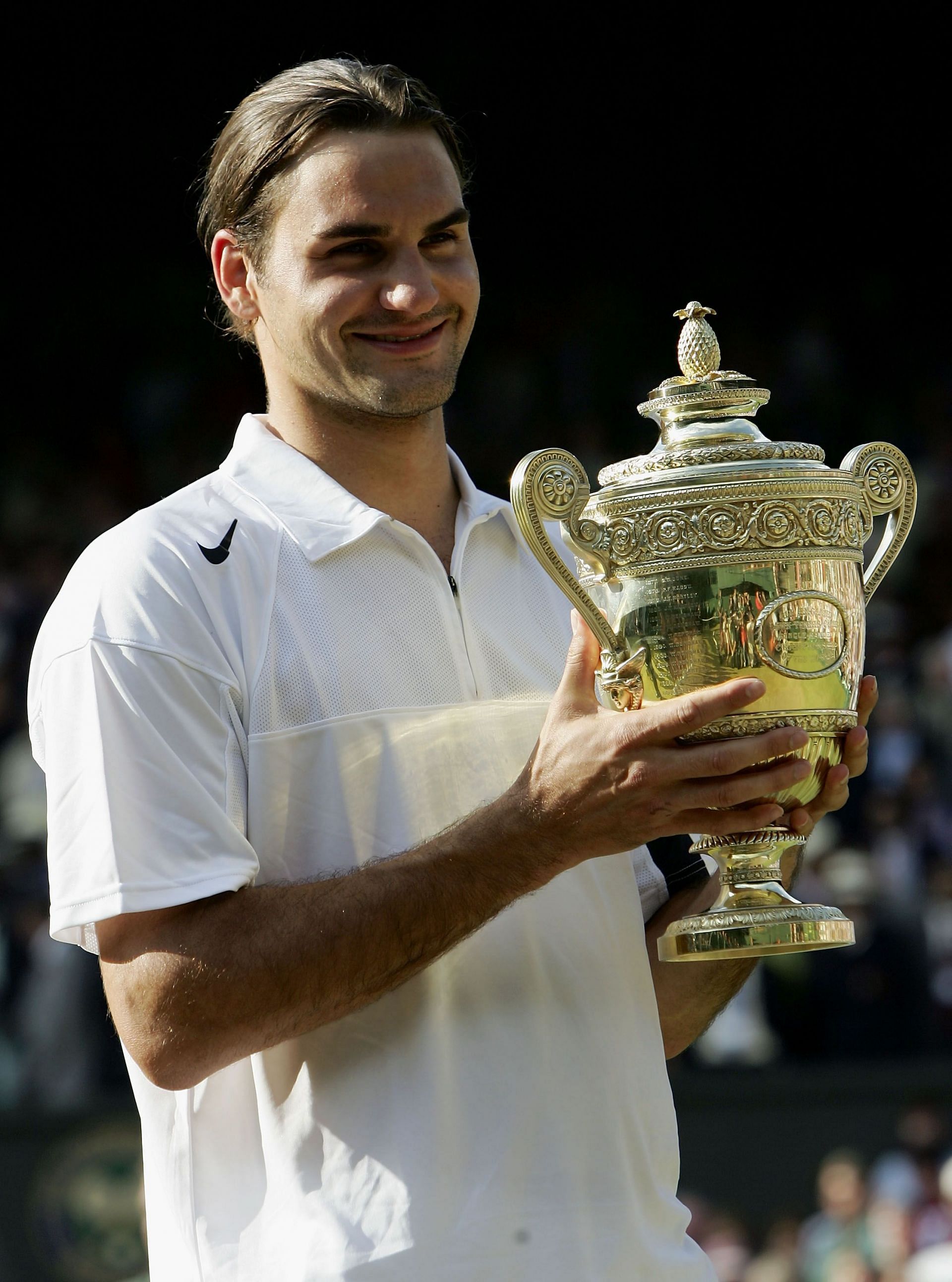 Roger Federer after winning his consecutive Wimbledon title in 2004