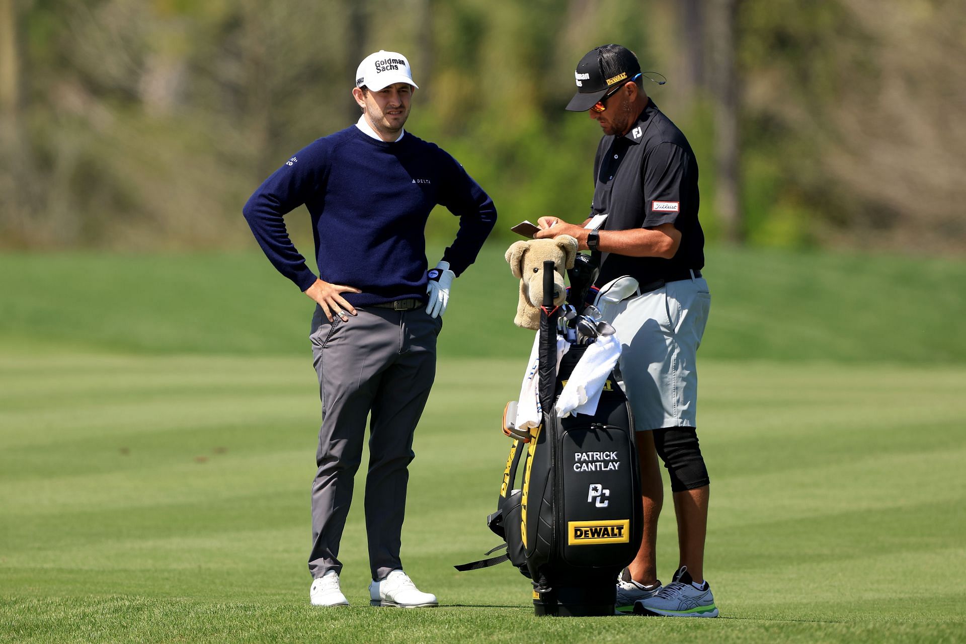 : Patrick Cantlay of the United States with caddie Matt Minister during the pro-am prior to The Genesis Invitational at Riviera Country Club in 2023 in Pacific Palisades, California. (Photo by Cliff Hawkins/Getty Images)