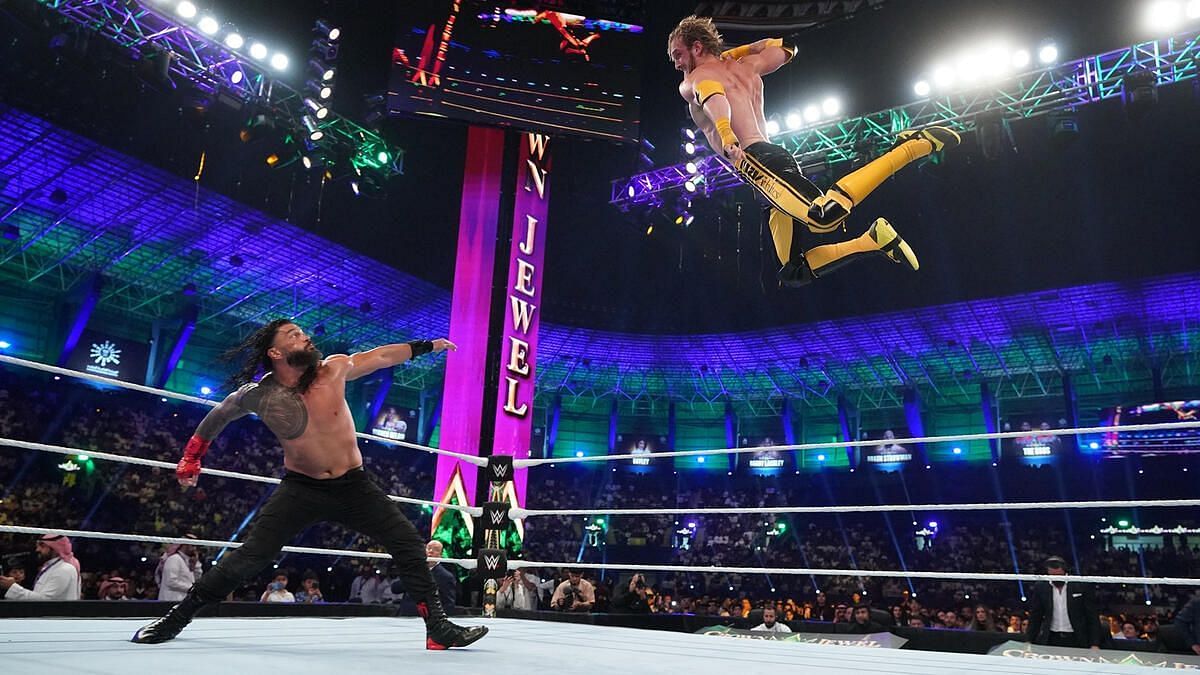 Logan Paul hits Roman Reigns with his version of the latter&#039;s Superman Punch at Crown Jewel 2022