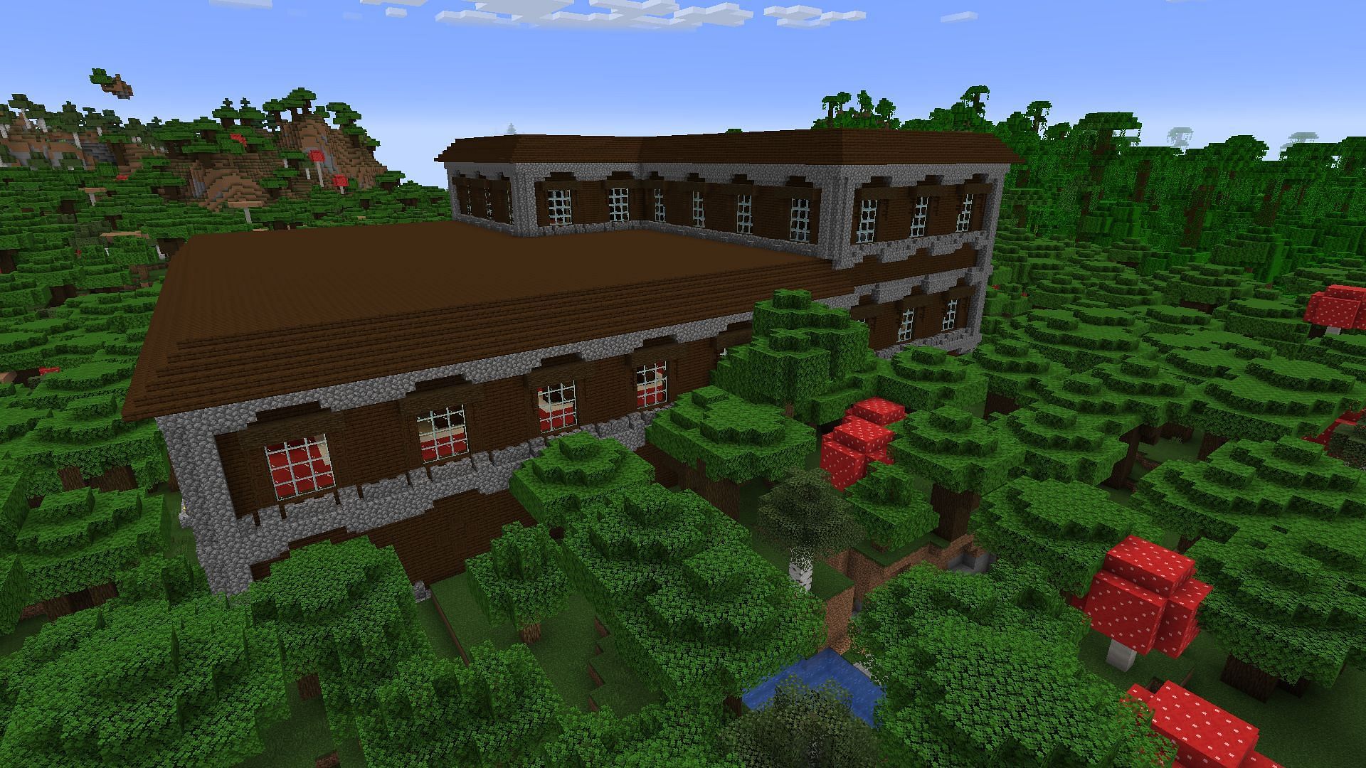 This woodland mansion has a background jungle trees and cocoa beans (Image via Mojang)