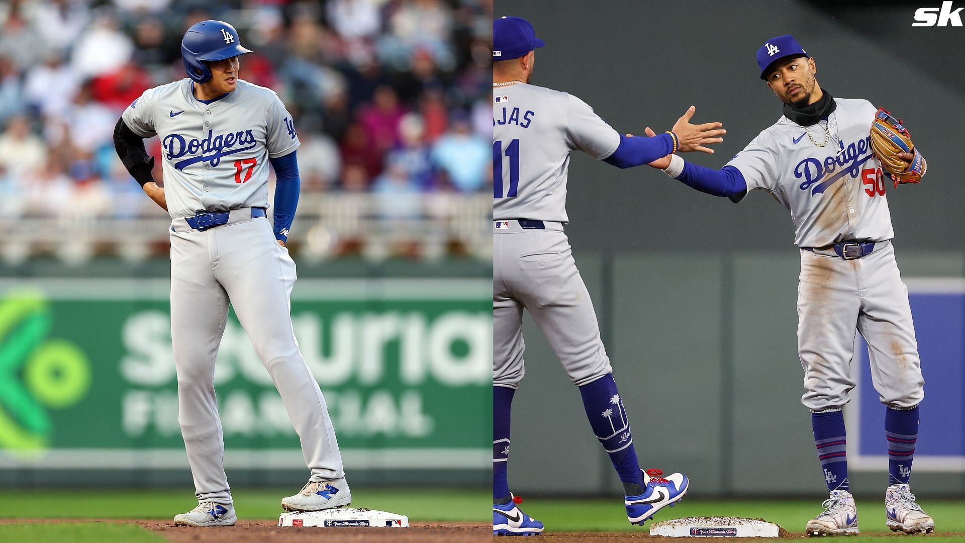 Shohei Ohtani of the Los Angeles Dodgers looks on after hitting a double against the Minnesota Twins in the third inning at Target Field