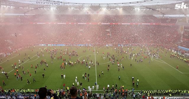 WATCH: Bayer Leverkusen fans storm the BayArena and chant Xabi Alonso's ...