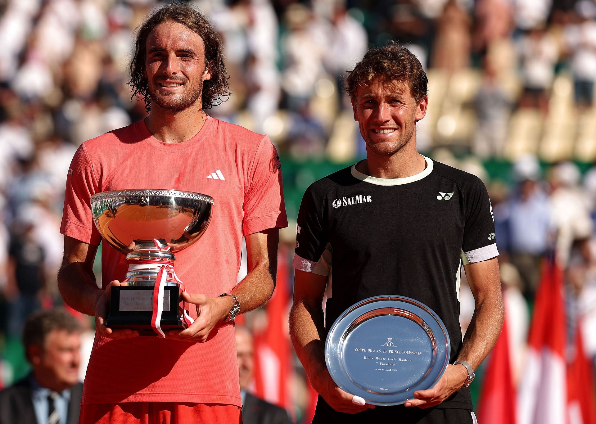 Stefanos Tsitsipas (L) and Casper Ruud (R) during the trophy presentation ceremony at the 2024 Monte-Carlo Masters