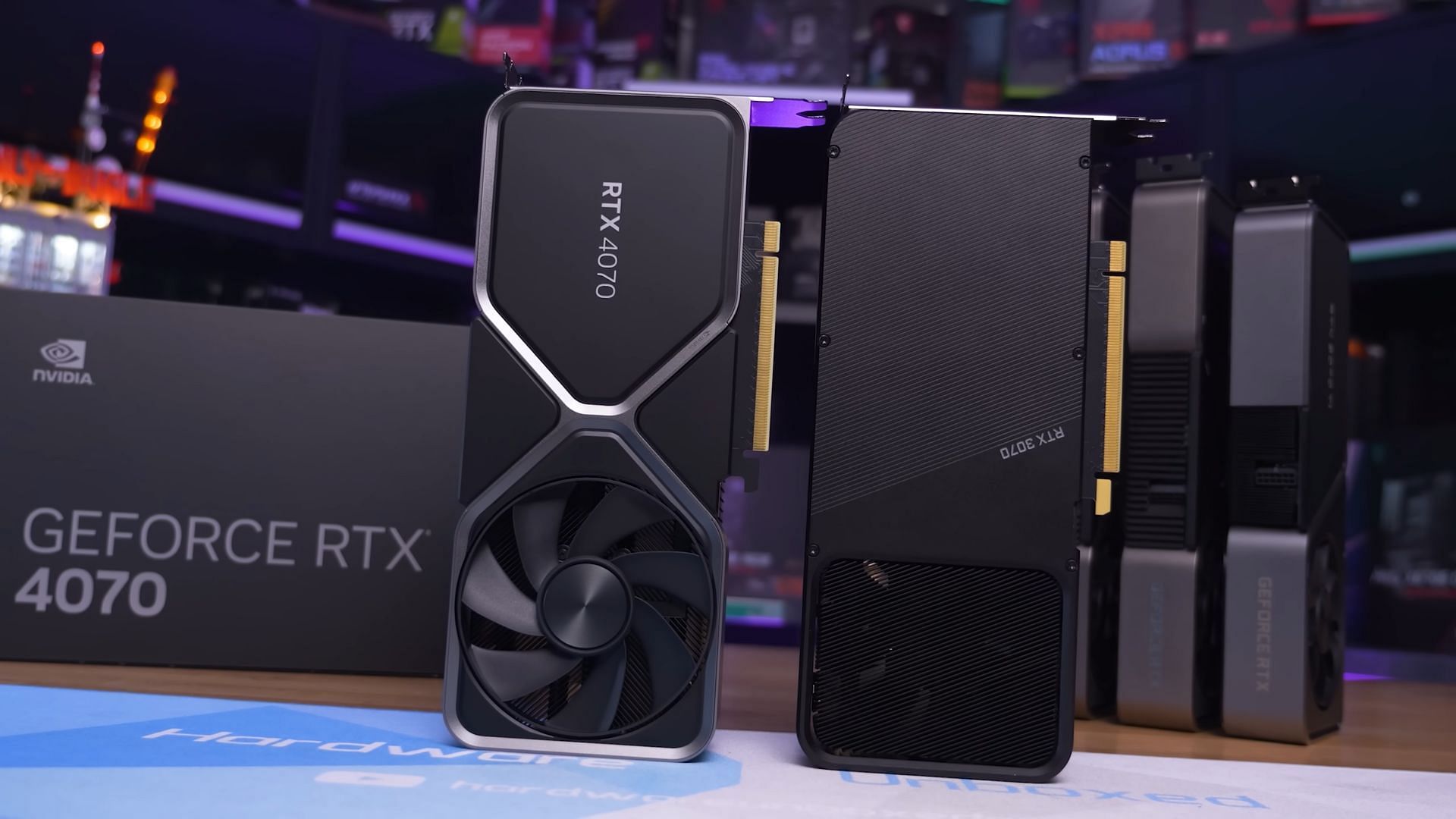 The Nvidia RTX 4070 from both sides and the box (Image via Hardware Unboxed/YouTube)