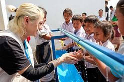 Stray Kids' Felix does volunteer work for Water and Sanitation Health (WASH) at school with UNICEF Laos