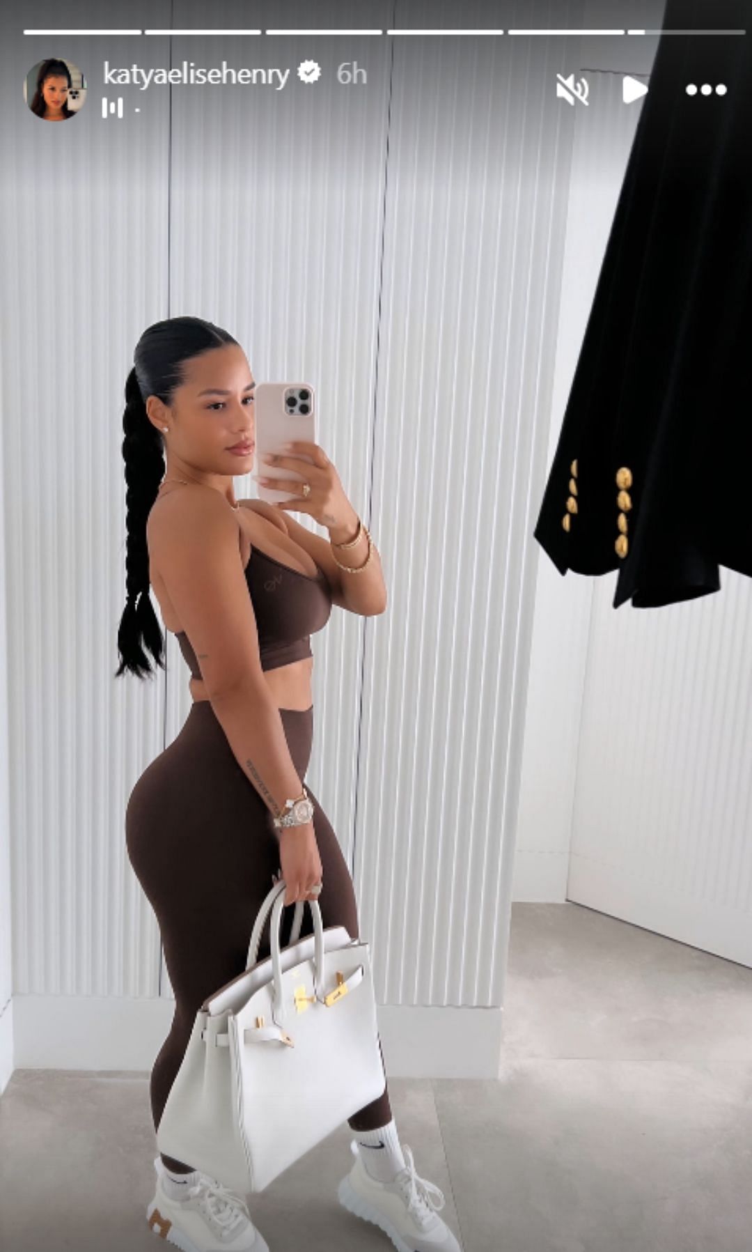Katya Elise Henry rocking the Hermes bag paired with her workout fit