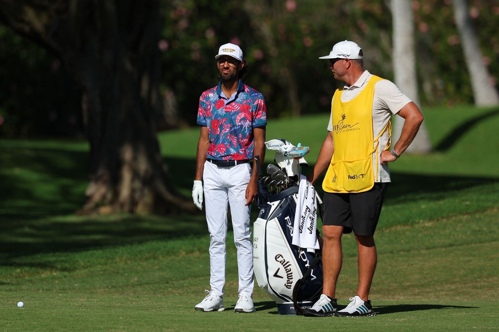 Akshay Bhatia of the United States and his caddie, Brian Dilley (Photo by Kevin C. Cox/Getty Images)