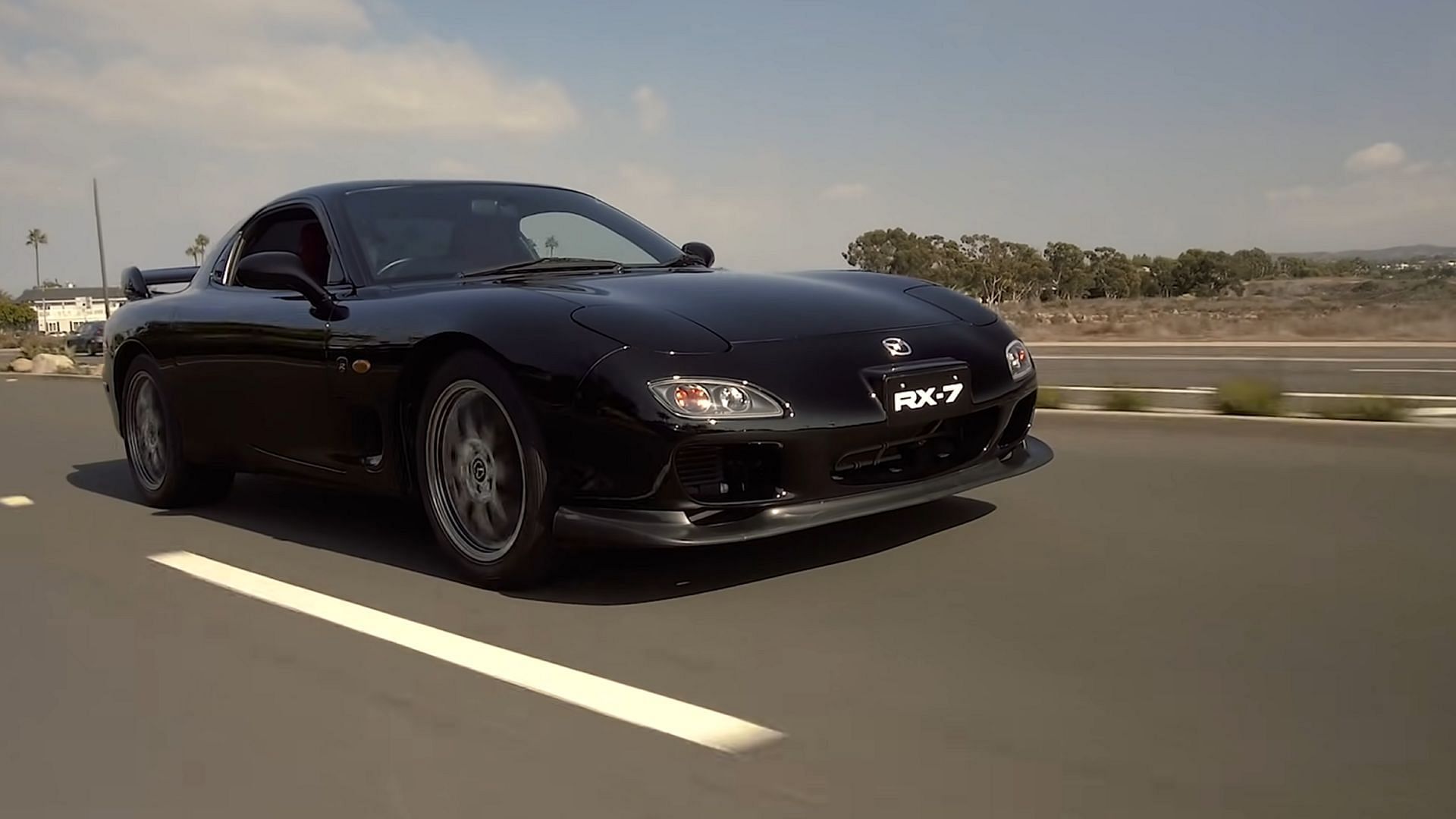 The 2002 Mazda RX-7 Spirit R is among the best JDM cars (Image via YouTube/Petrolicious)