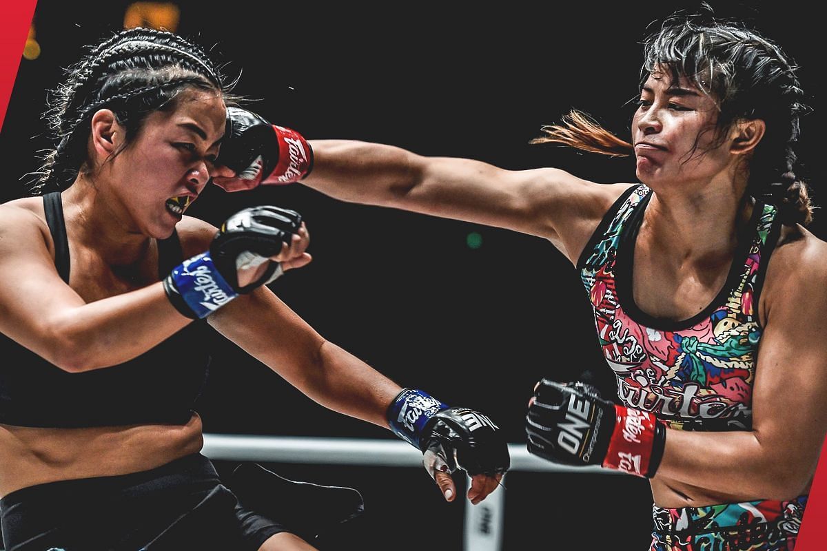 Stamp (right) fighting Bi Nguyen (left) [