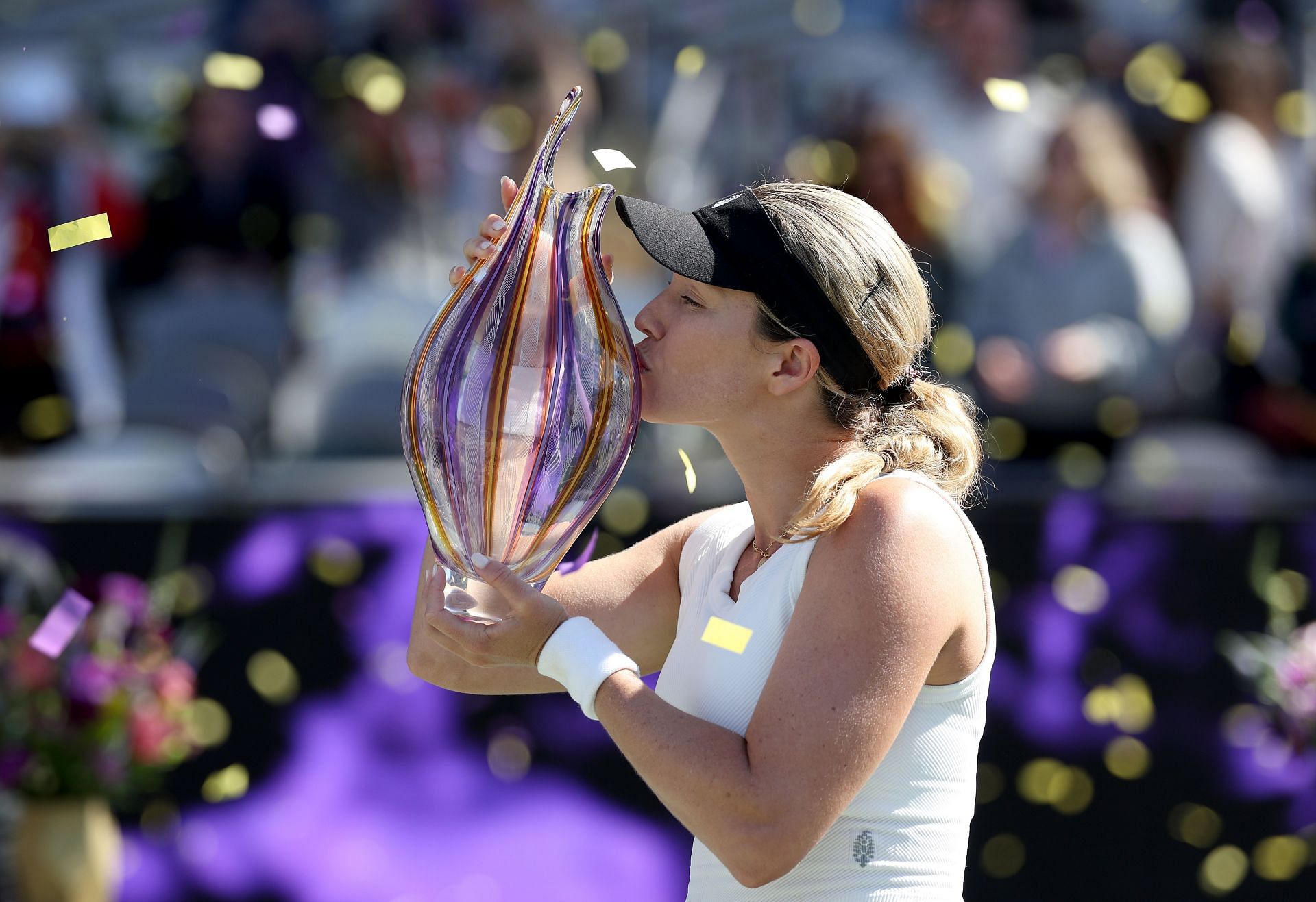 Danielle Collins kisses the Charleston Open trophy