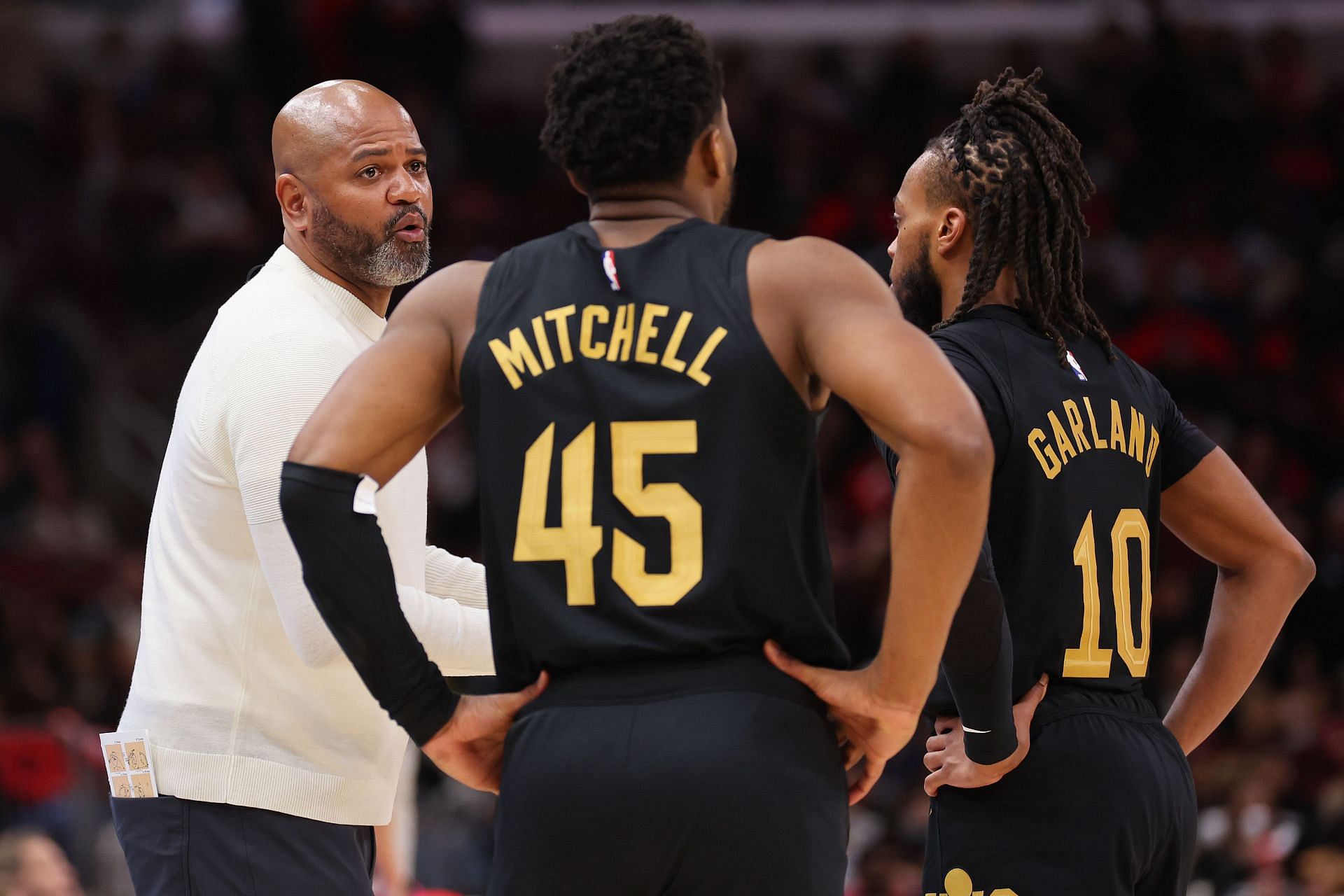 Cleveland Cavaliers coach J.B. Bickerstaff (left) and Cavaliers star guards Donovan Mitchell (middle) and Darius Garland (right)