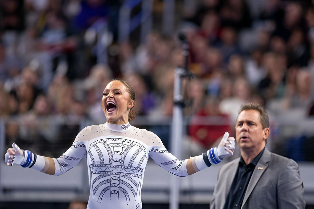 Savannah Schoenherr of LSU celebrates her bar win during 2024 Women&#039;s NCAA Championships