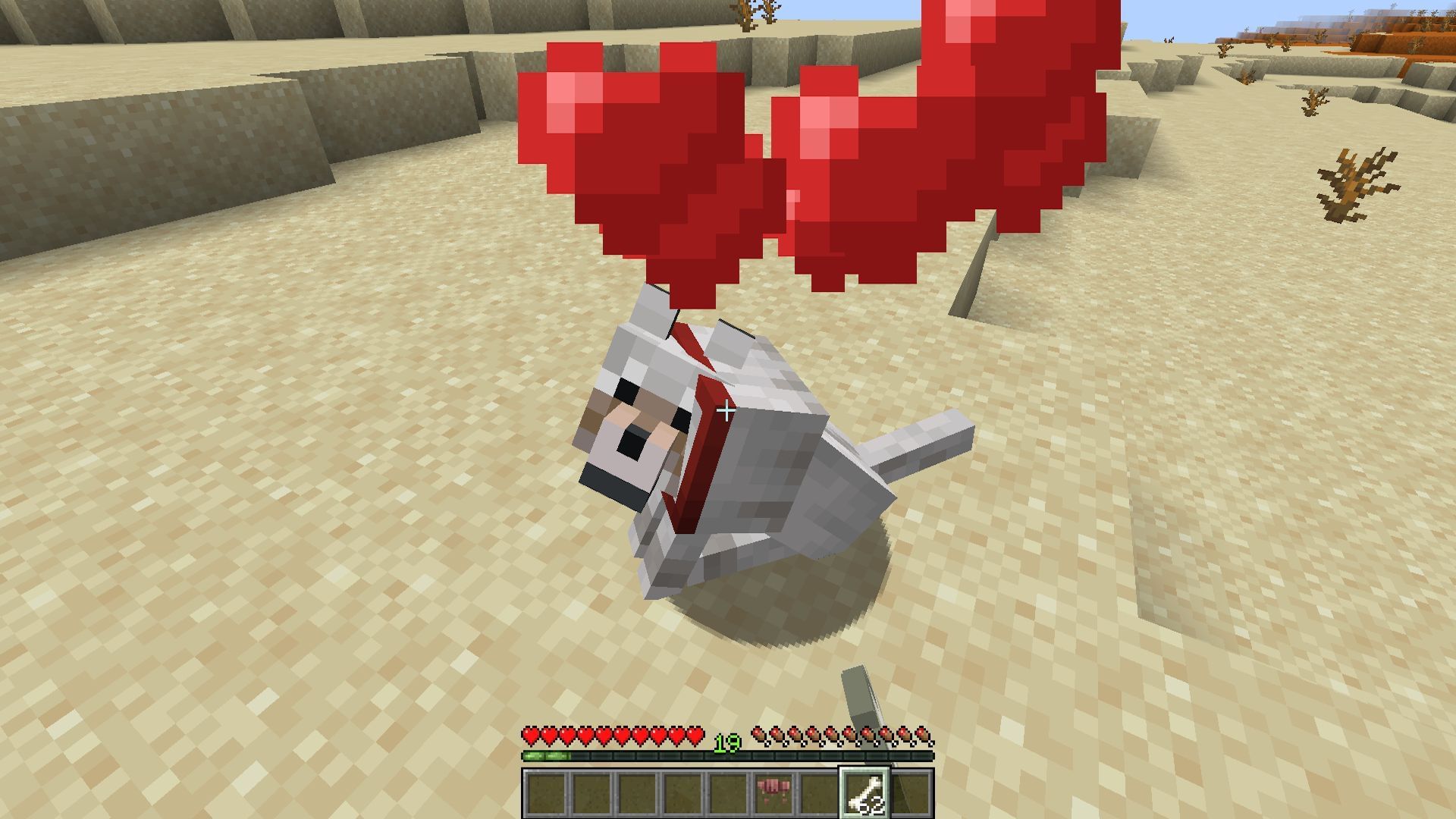 Make sure to bring enough bones to tame the wolf (Image via Mojang Studios)