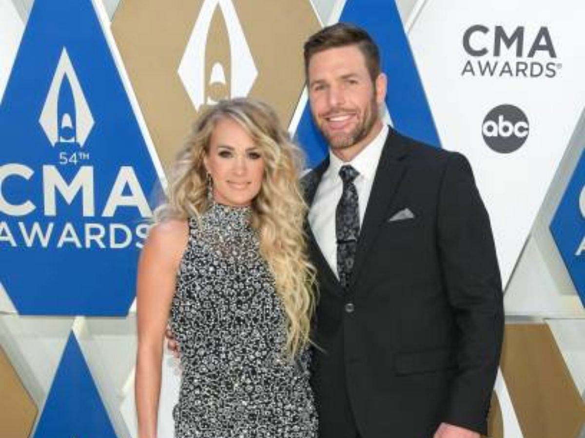 Carrie Underwood and Mike Fisher at the 54th CMA Awards (Image via Getty)
