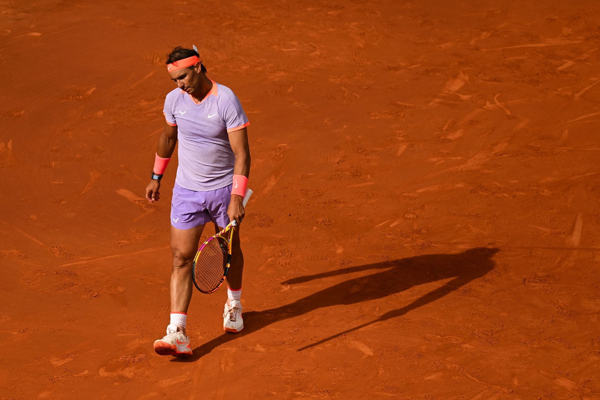 Rafael Nadal looking dejected during his second-round loss to Alex de Minaur at the Barcelona Open