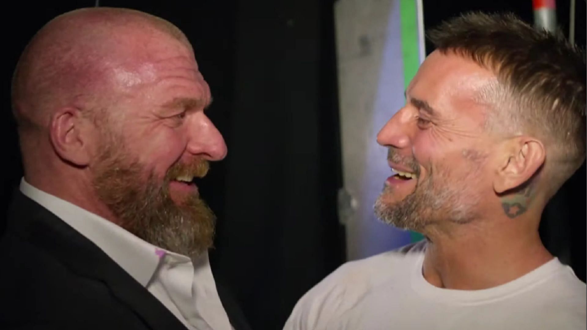 Triple H backstage with CM Punk [Image credits: WWE