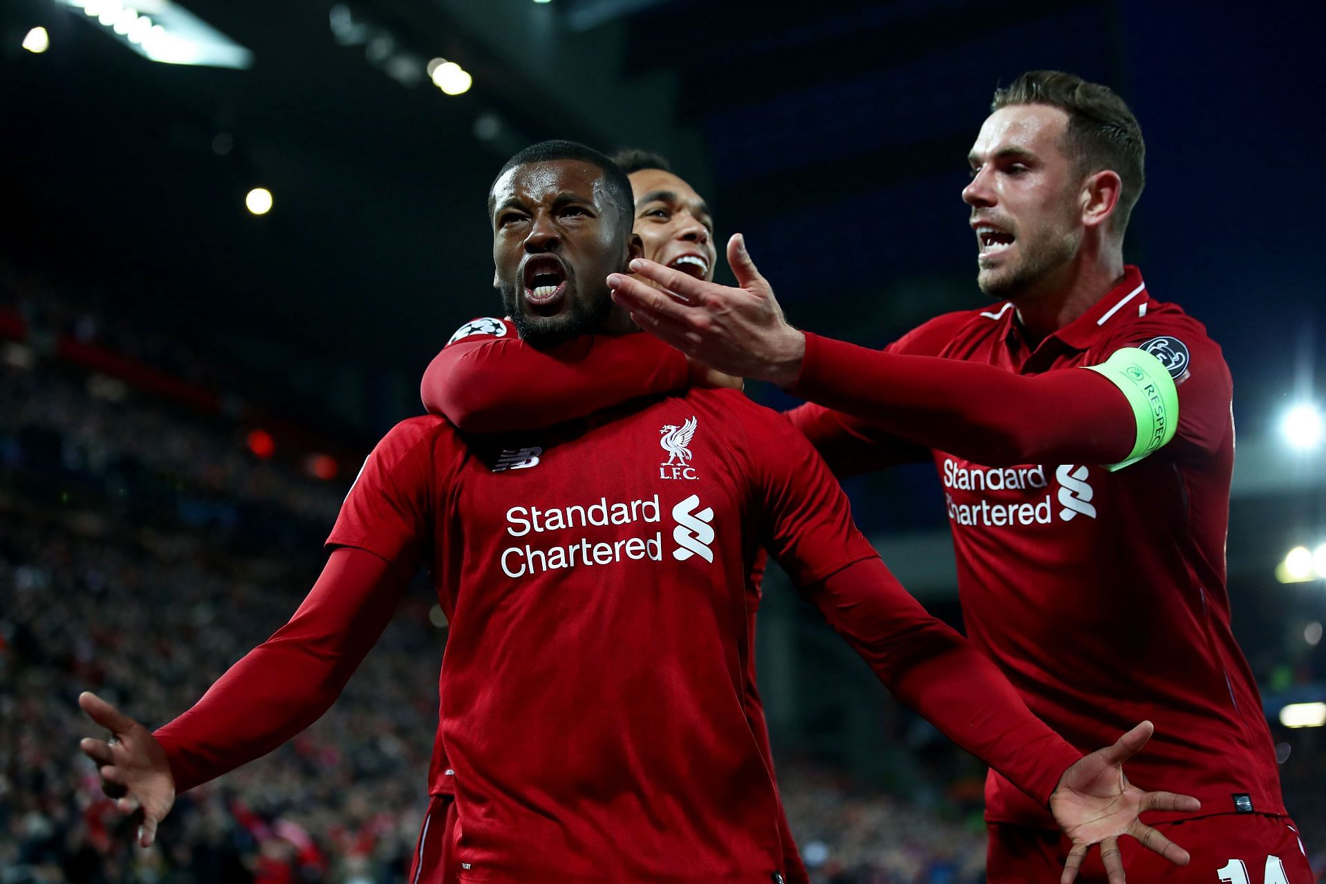 Gini Wijnaldum celebrates after equalling the score in the tie