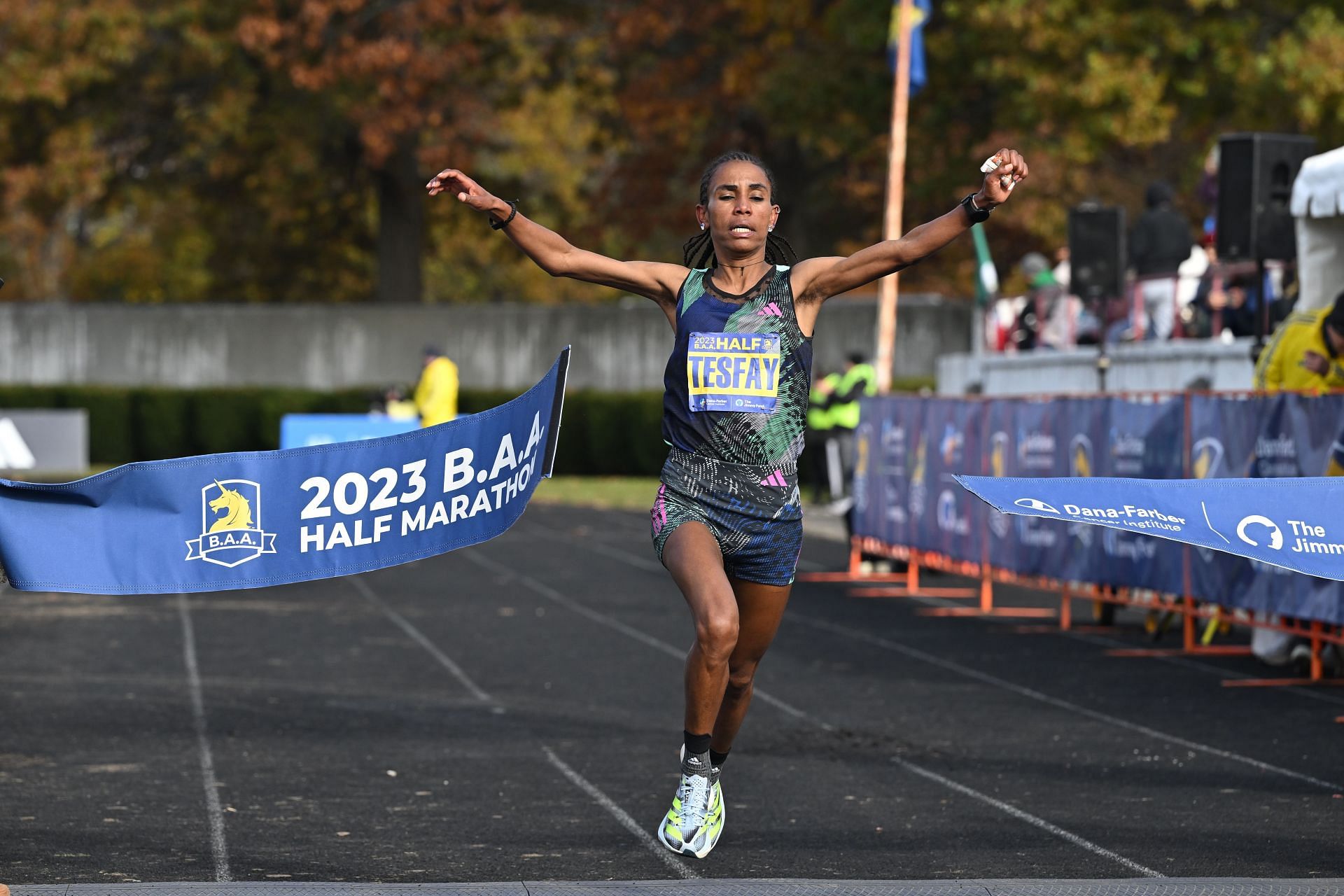 Fotyen Tesfay crosses the finish line to win the 2023 Women&#039;s Boston Half Marathon in Massachusetts.